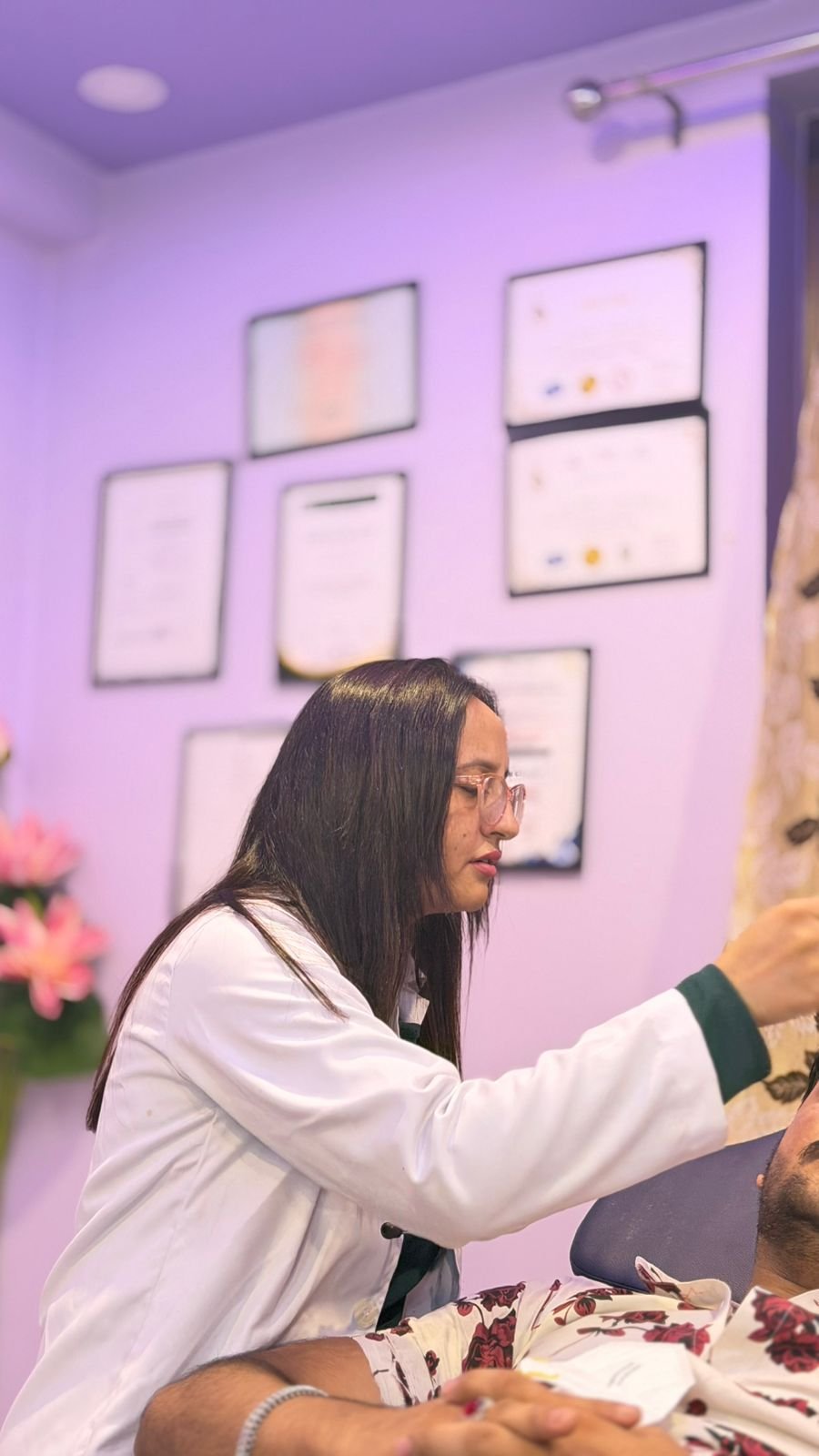 Dr. Swati Chauhan attending a patient at Tejas Skin and Hair Clinic